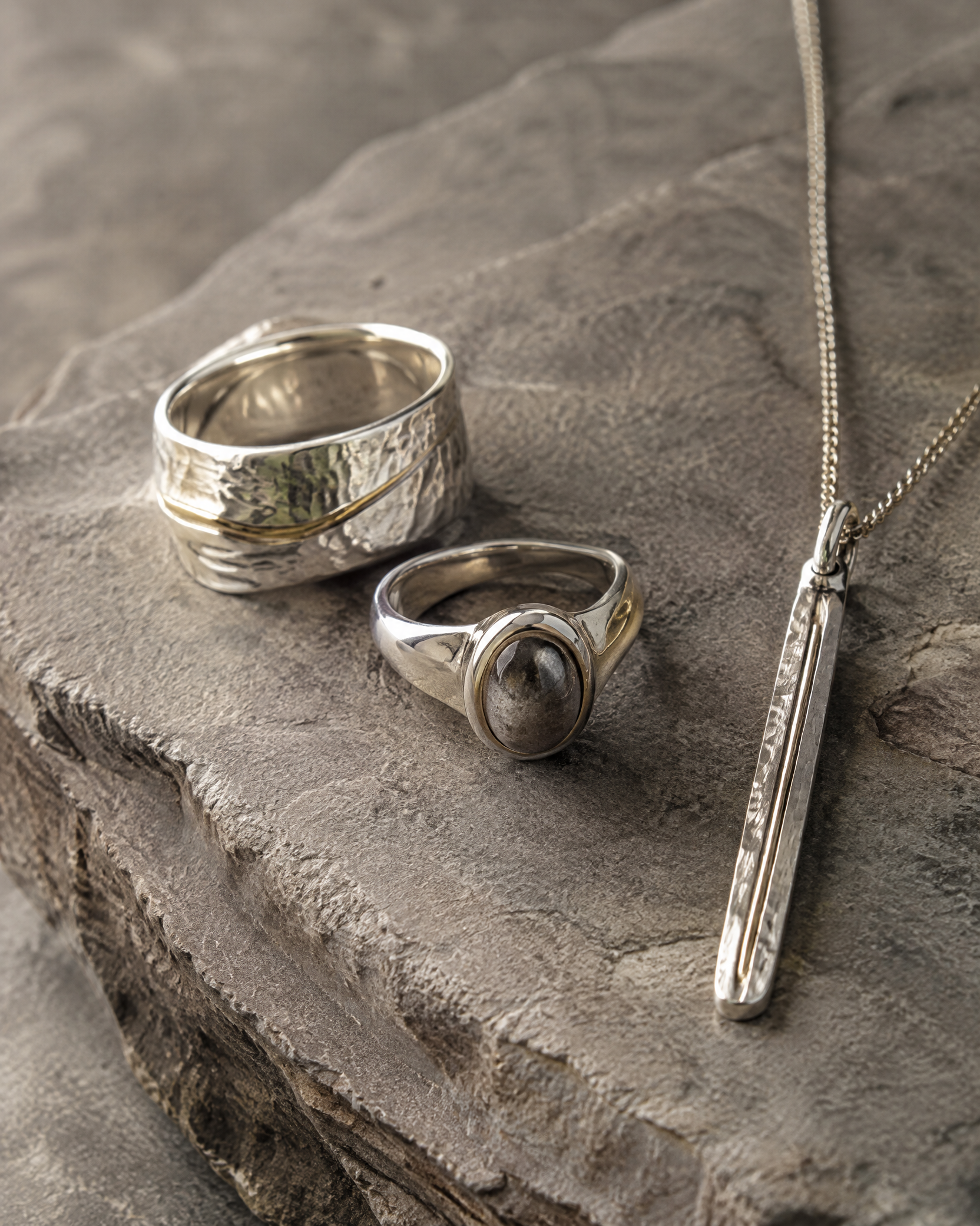 Handcrafted sterling silver rings and pendant